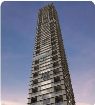 Torre residencial alta vista de baixo ao entardecer, projeto elétrico da Automatize